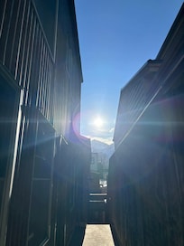 My Granddaughter caught this Beautiful Photo between the Buildings, like Stonehenge in England !!