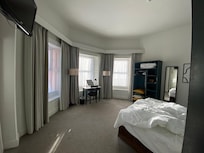 Room with a king sized bed