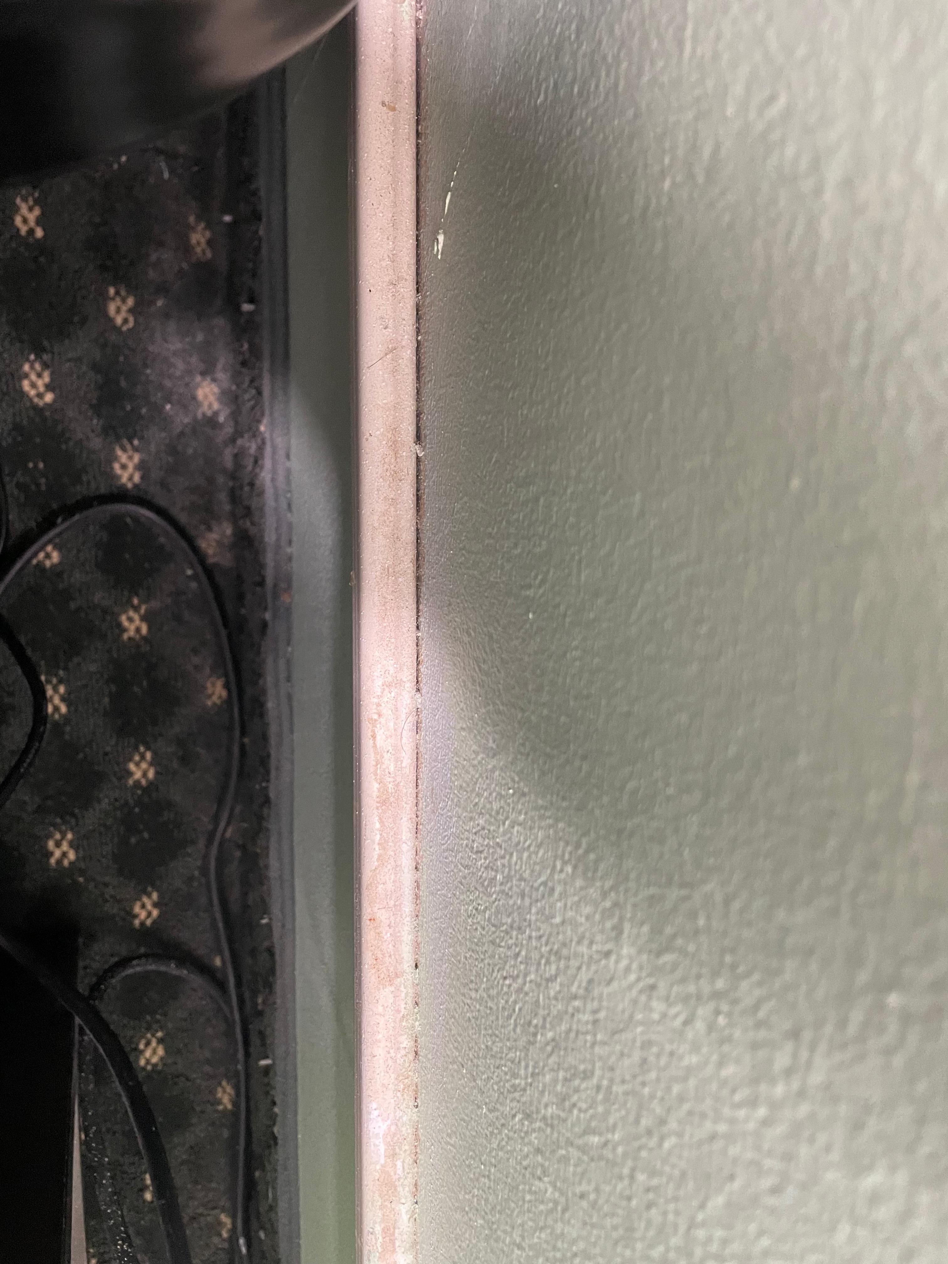 Behind the bed