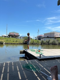The minute we drove up he was on the pier.