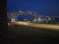 Blue water bridge at night