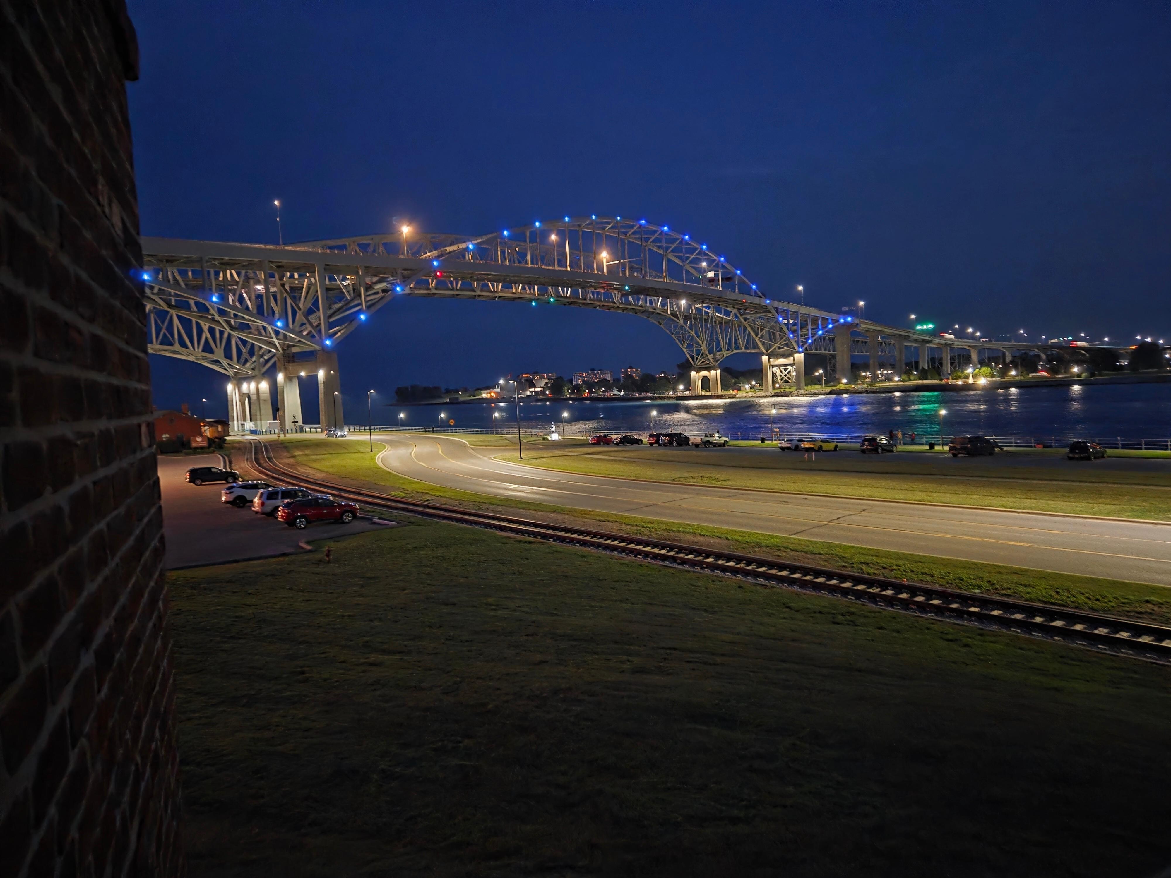 Blue water bridge at night