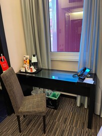 Desk facing brok wall