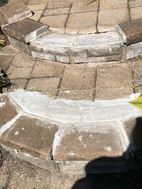 Broken front steps, tripping hazard