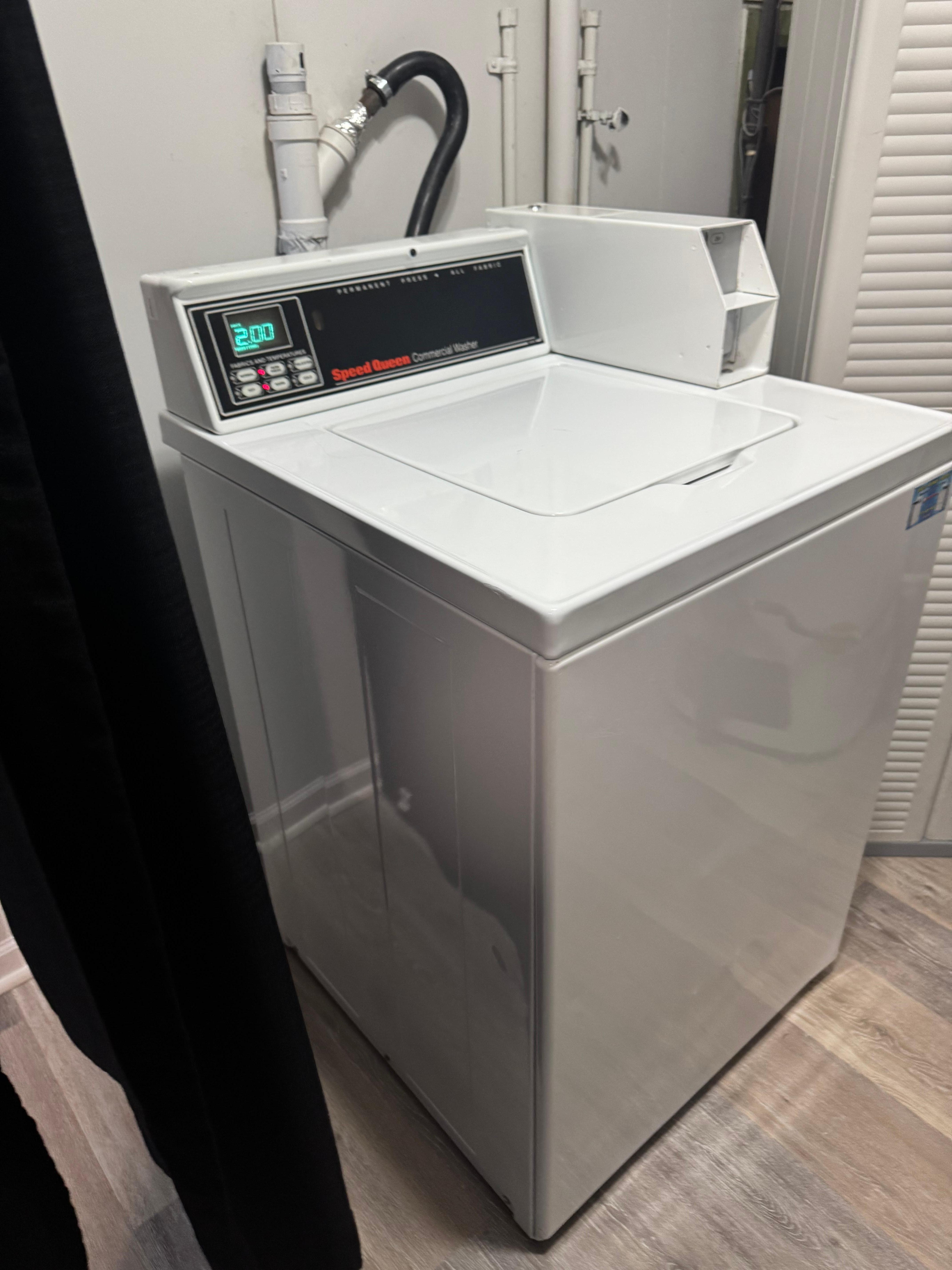 Coin operated washing machine.