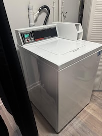 Coin operated washing machine.