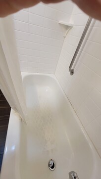 Bathtub mold on caulking surrounding tub. Very scratched and stains in bathtub