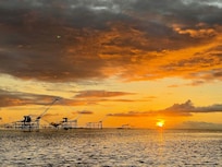 Spectacular sunrise on boat trip organised by resort -- just a few hundred meters from our room