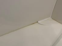 Peeling and completely absent caulk in shower