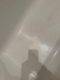Hair in tub