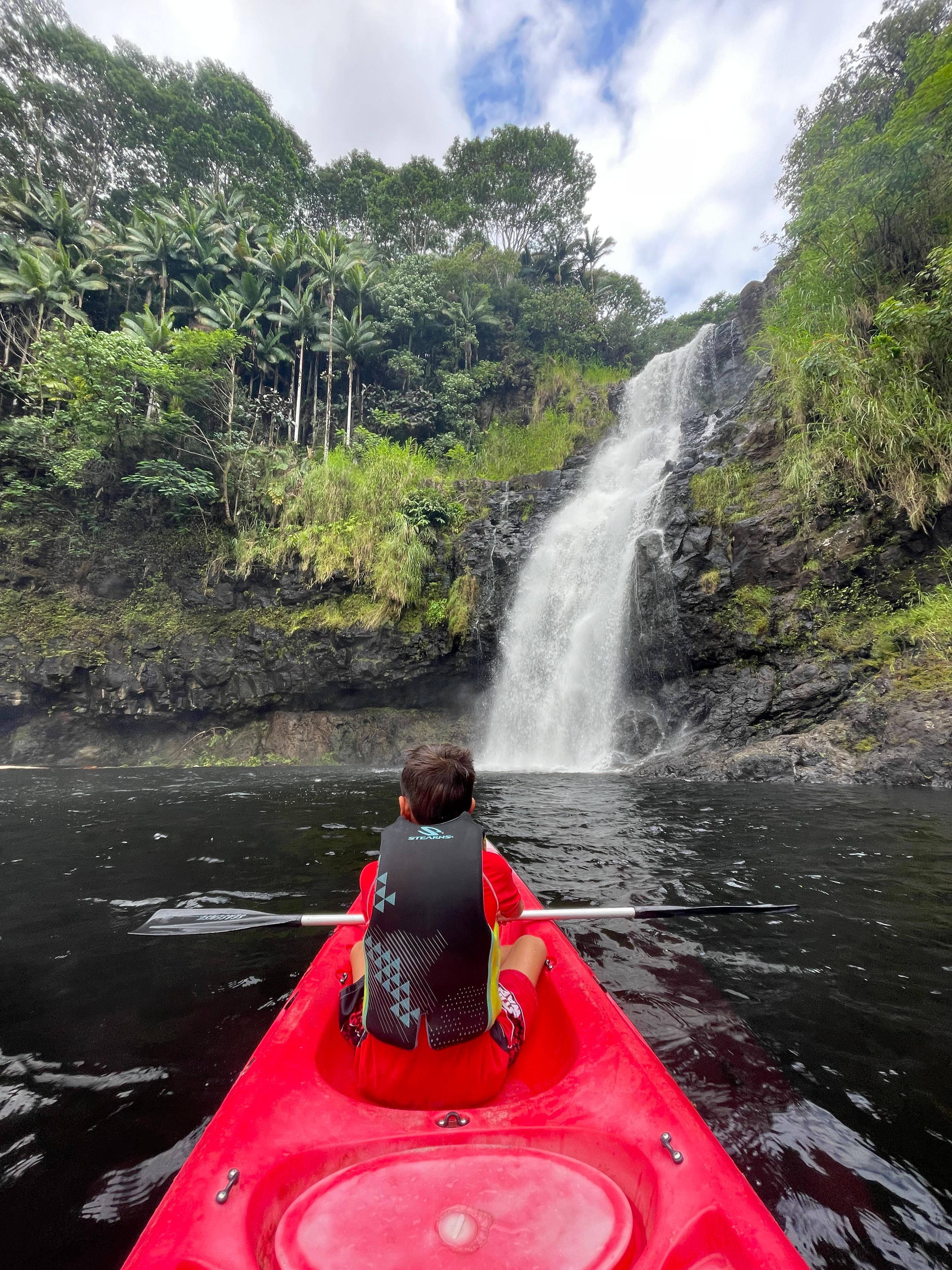 Kayaking down by the waterfall. 