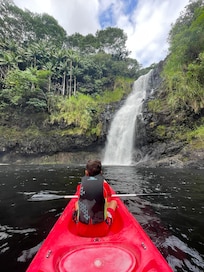 Kayaking down by the waterfall.