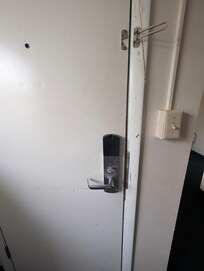 Door jam split, no dead bolt or safety latch.