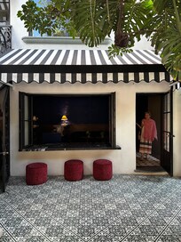 Loved this cozy corner—a velvet stool facing the bar and lounge area. The perfect perch for a slow afternoon cocktail.