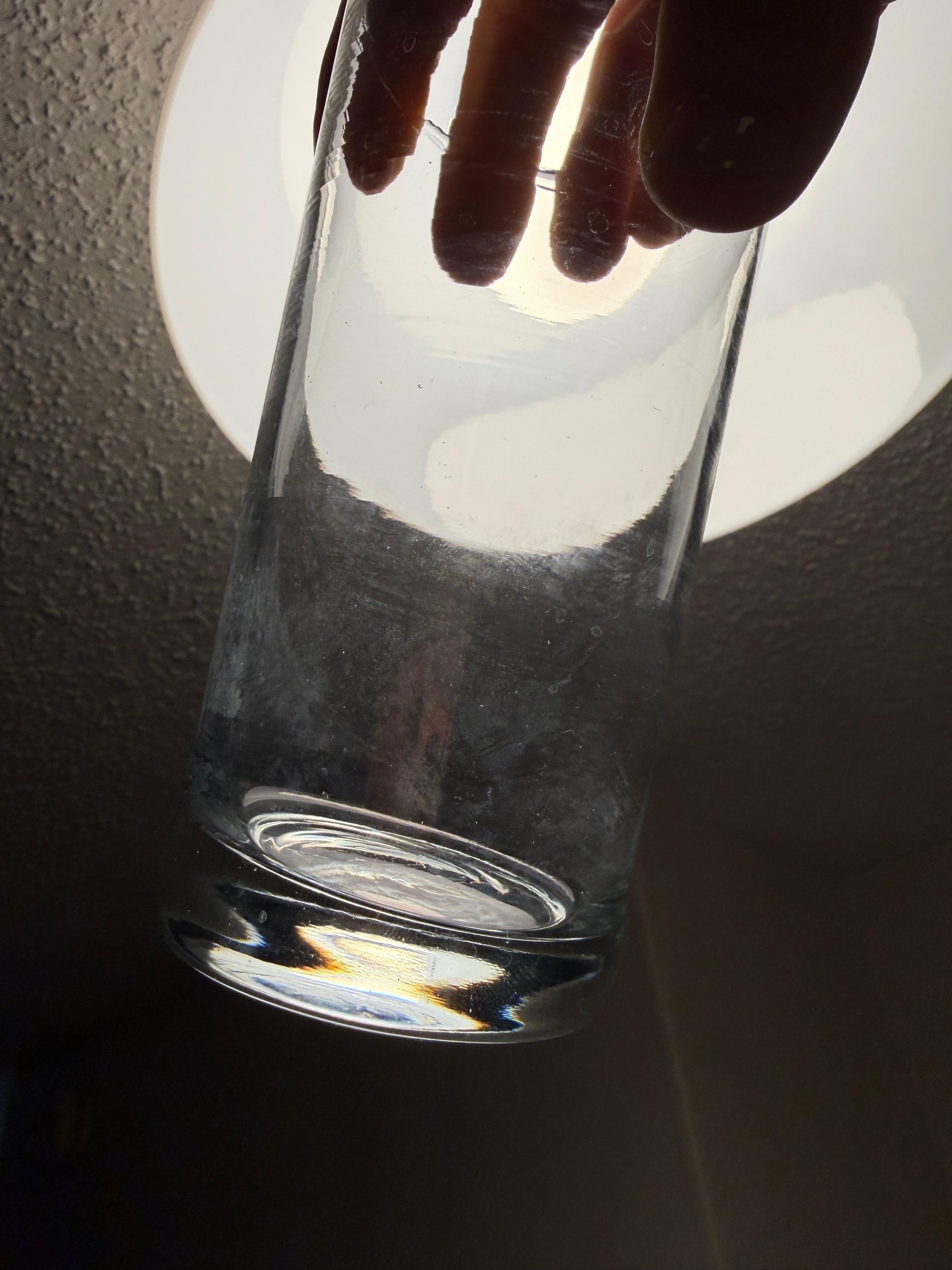 Dirty glass in the kitchenette. 