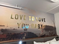 Wallpaper above our bed