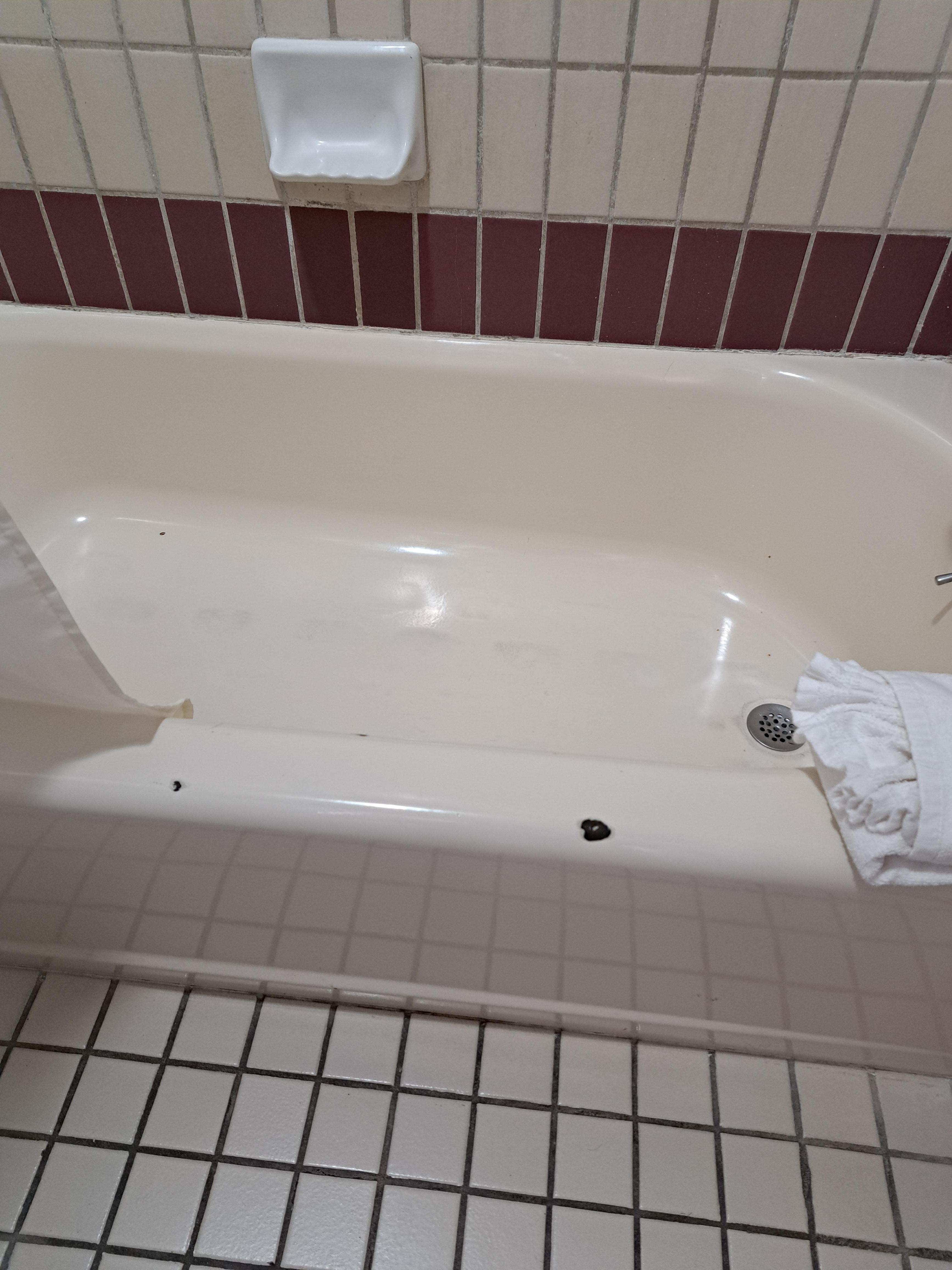 Chipped porcelain on tub