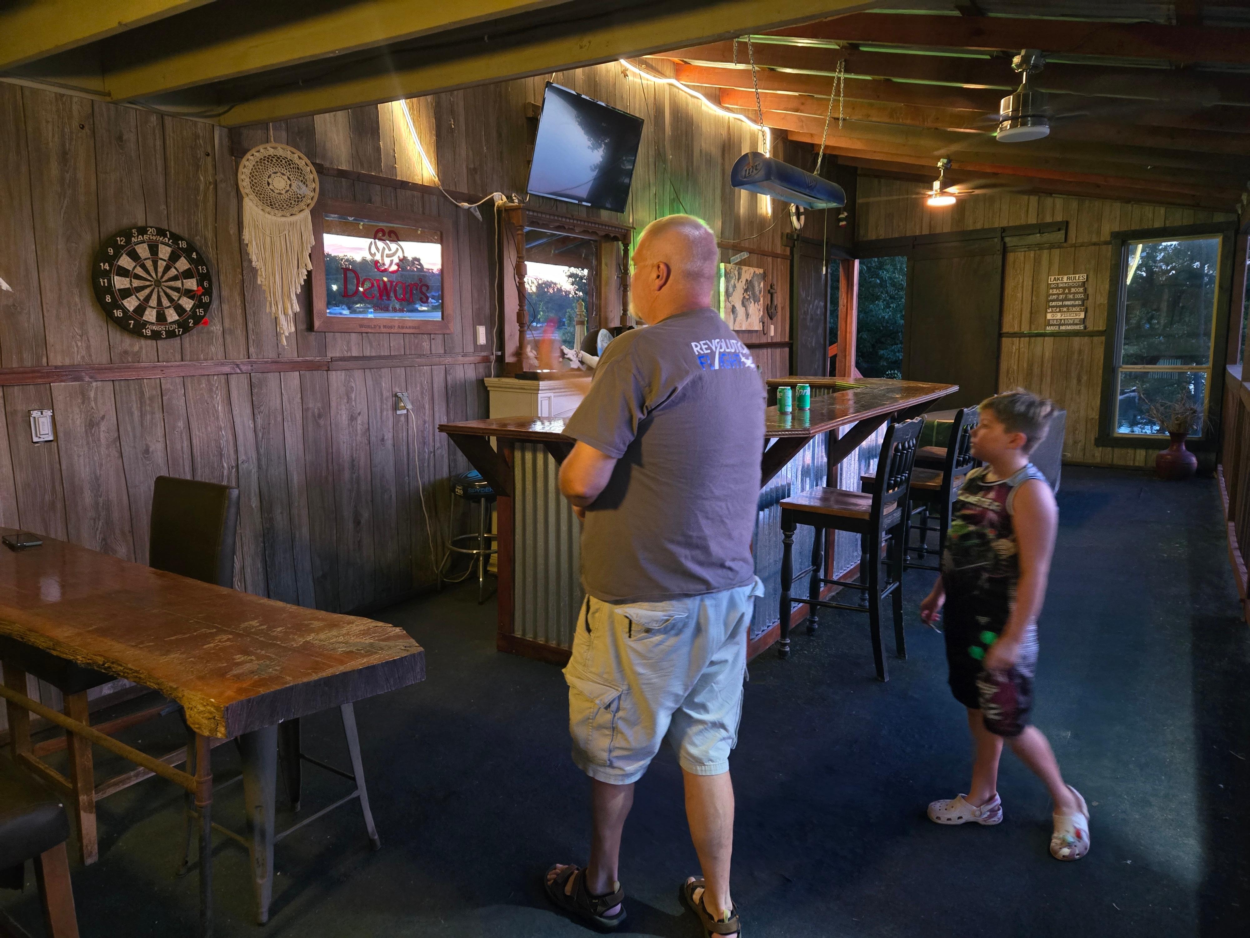 Playing darts in the party bar.
