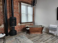 Nice bath but only got hot water 1 of 3 nights.Nice kitchen but one plate each, and one dinner fork, and 2 dessert forks, !!! Fridge too low,difficult to get at esp for seniors.Would not stay again