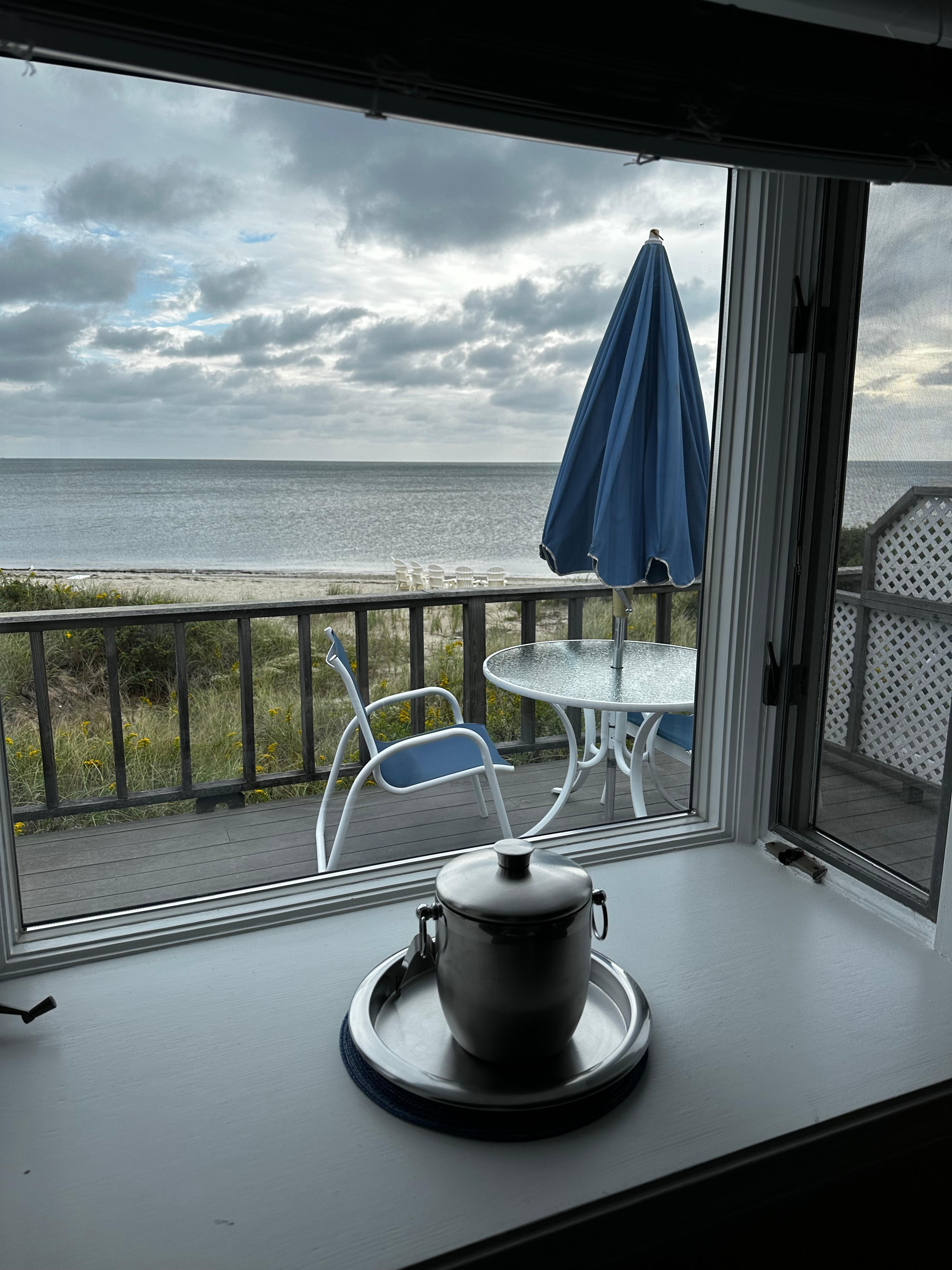 The beautiful water/beach view looking out our bay window. 