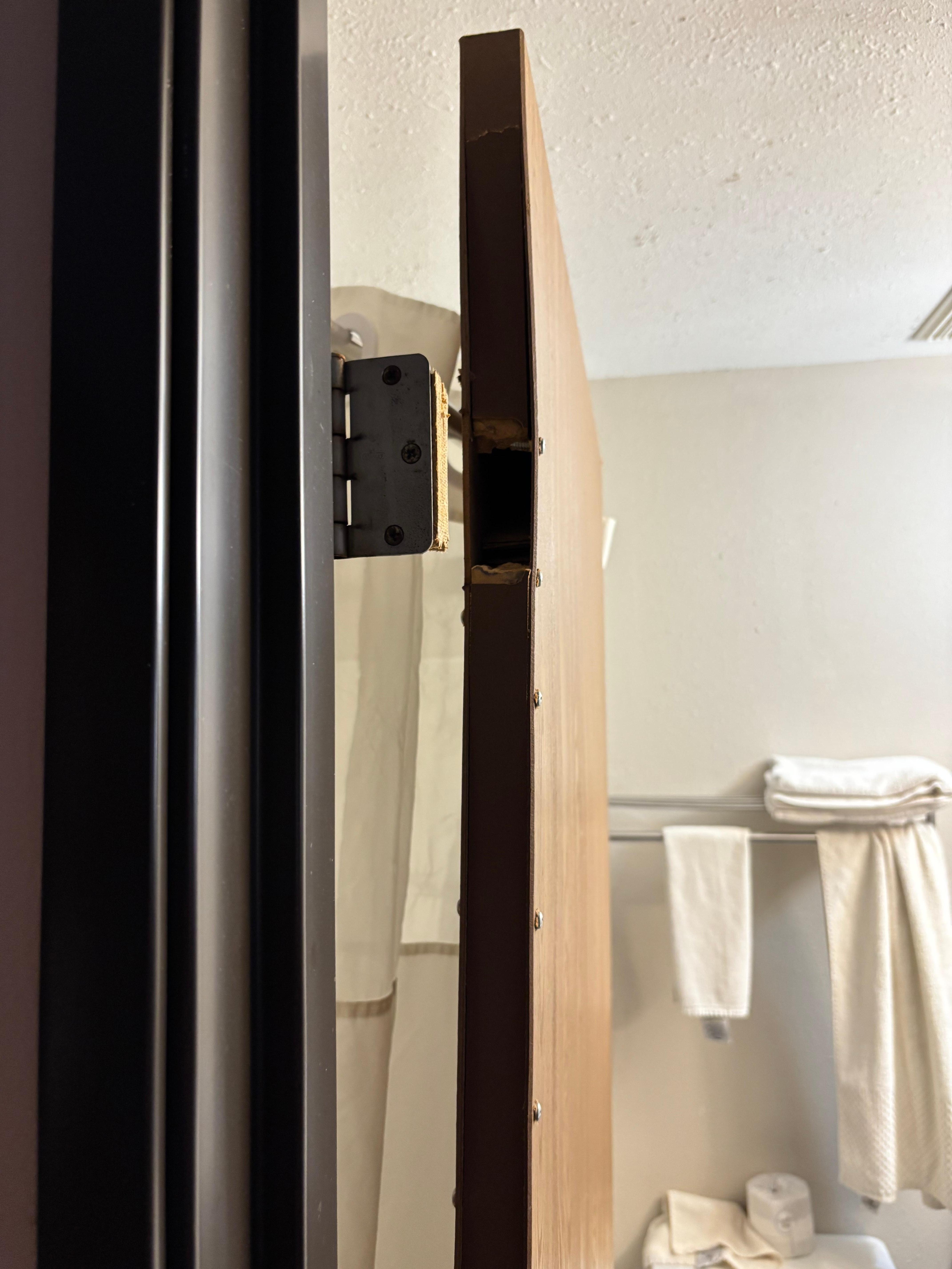 Bathroom door fell off the hinges