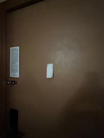 Peephole covered by toilet paper