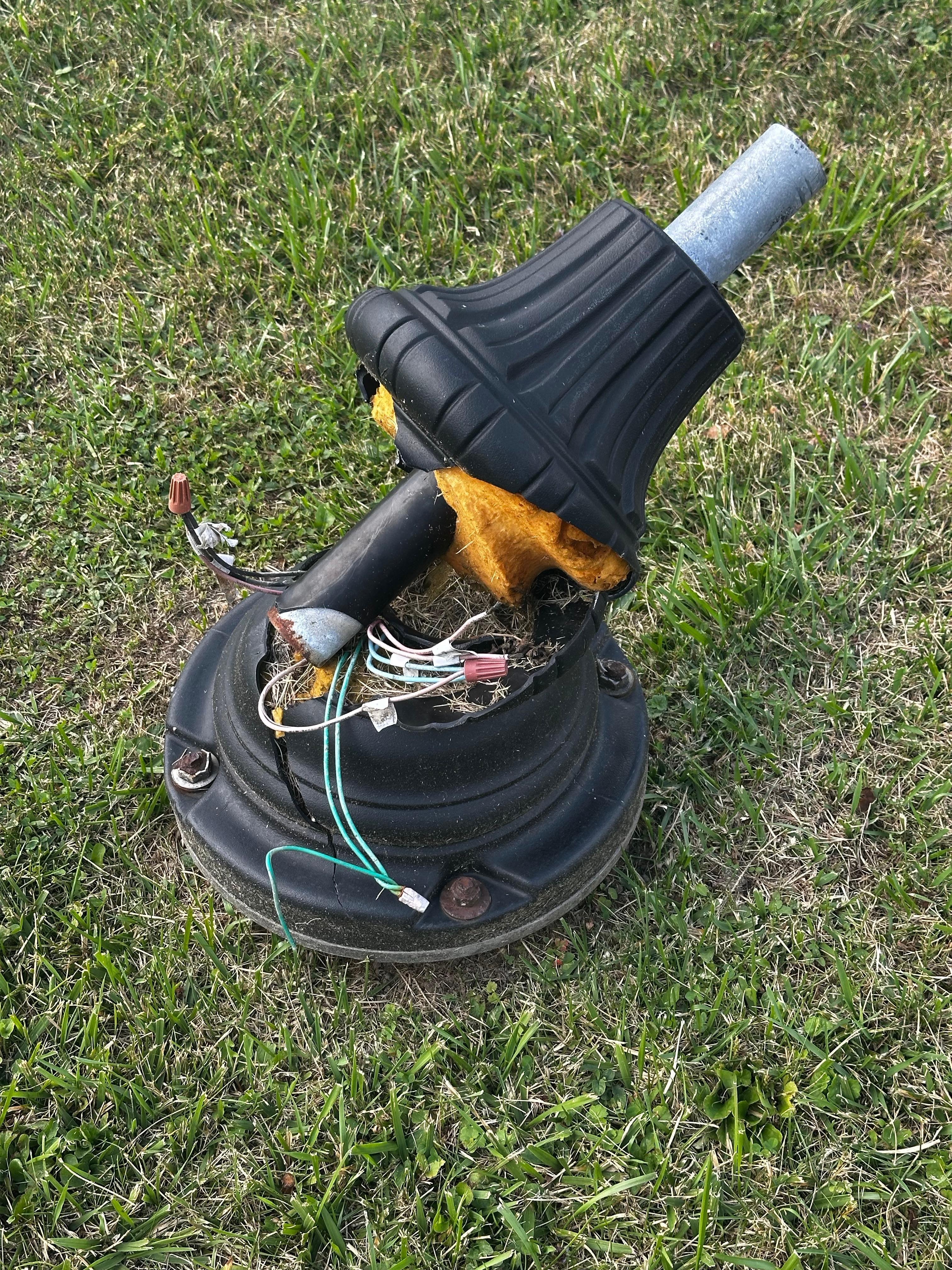 Broken lamp and exposed wiring