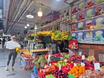 Fresh exotic fruit stands right across from the Carlton City hotel.