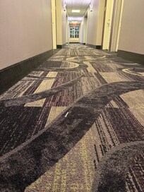 Where needle cap was located in hallway.