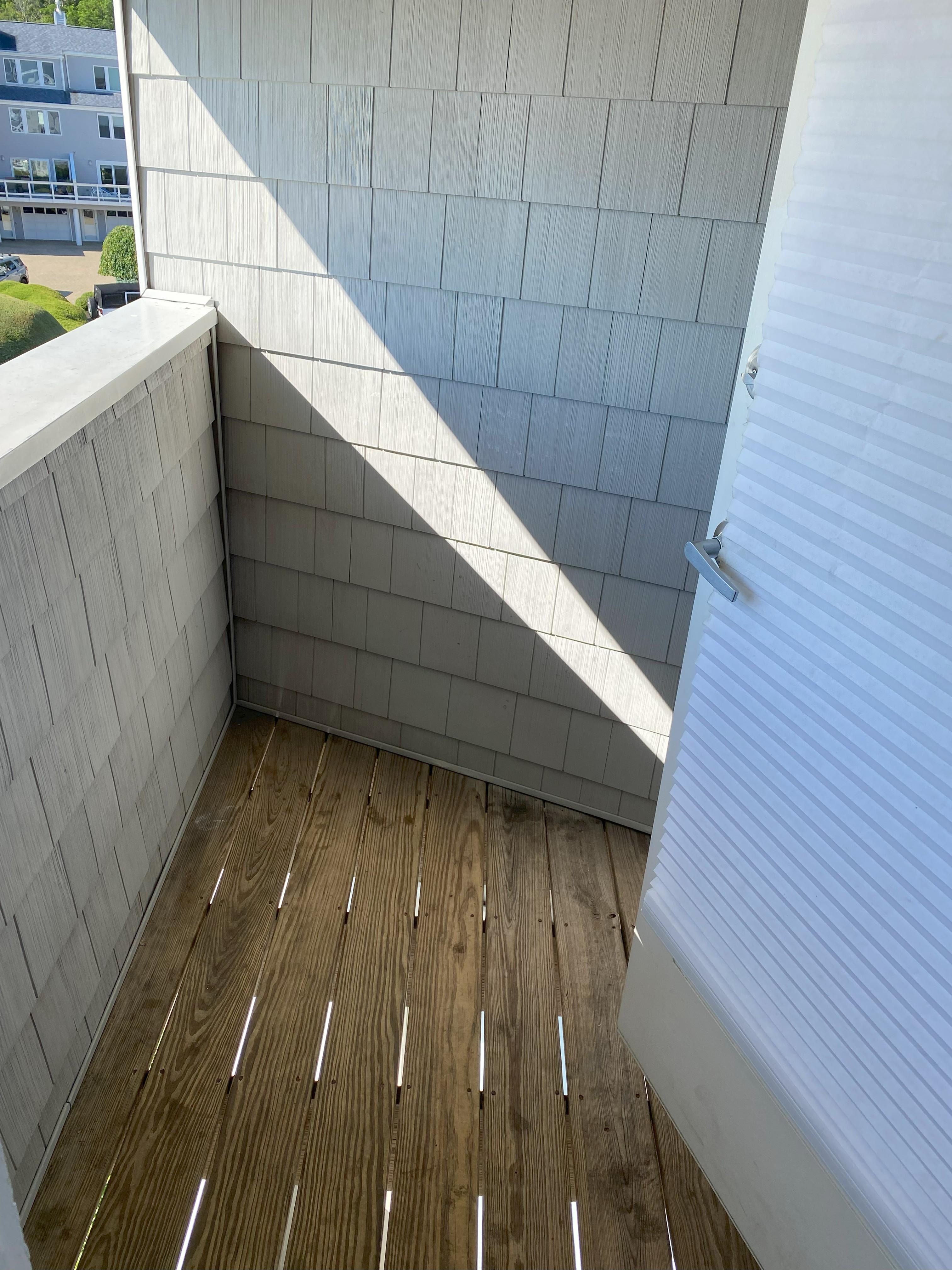 The "balcony" where you can barely stand when the door is open