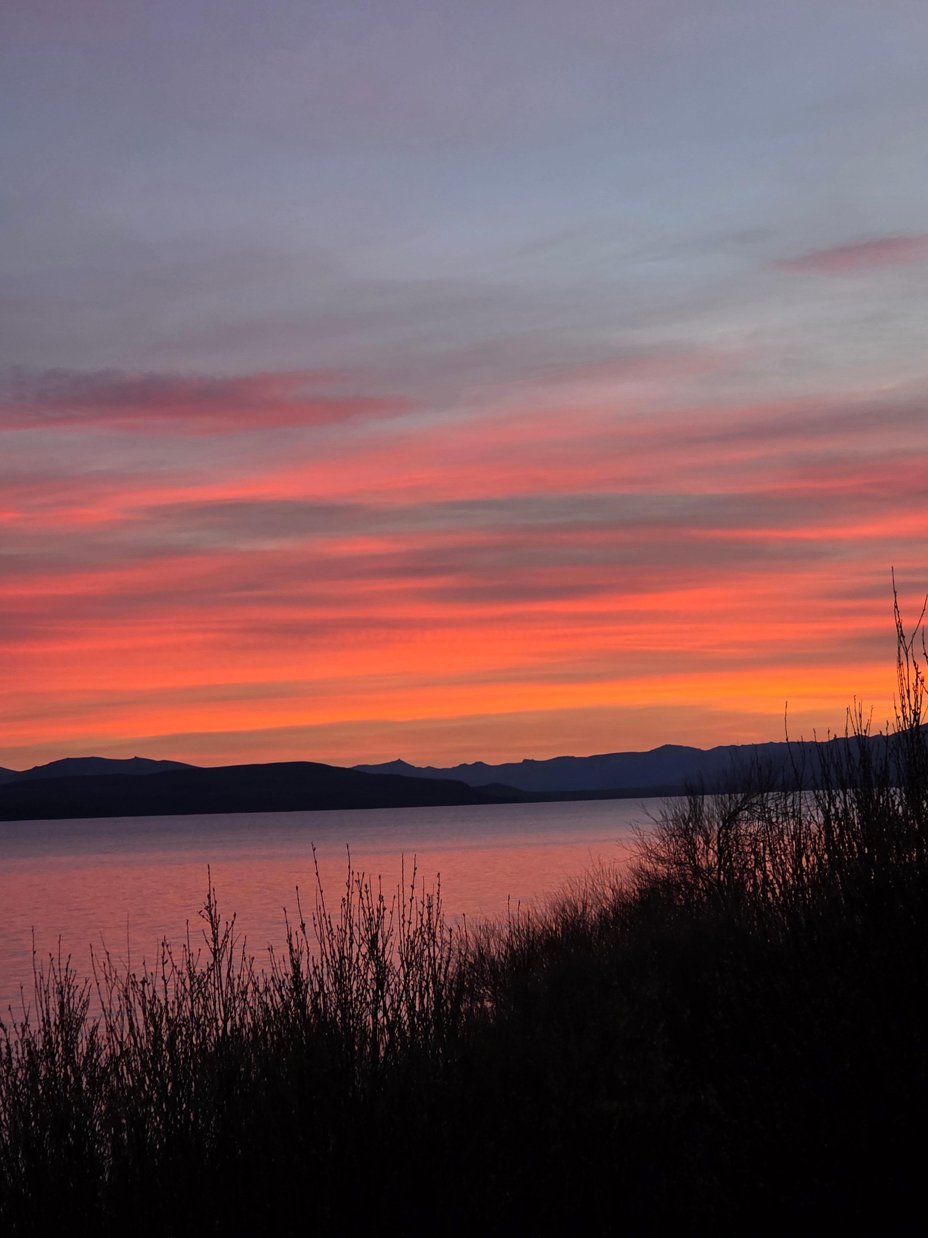 Sunrise from room across the lake.