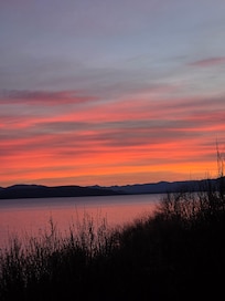 Sunrise from room across the lake.