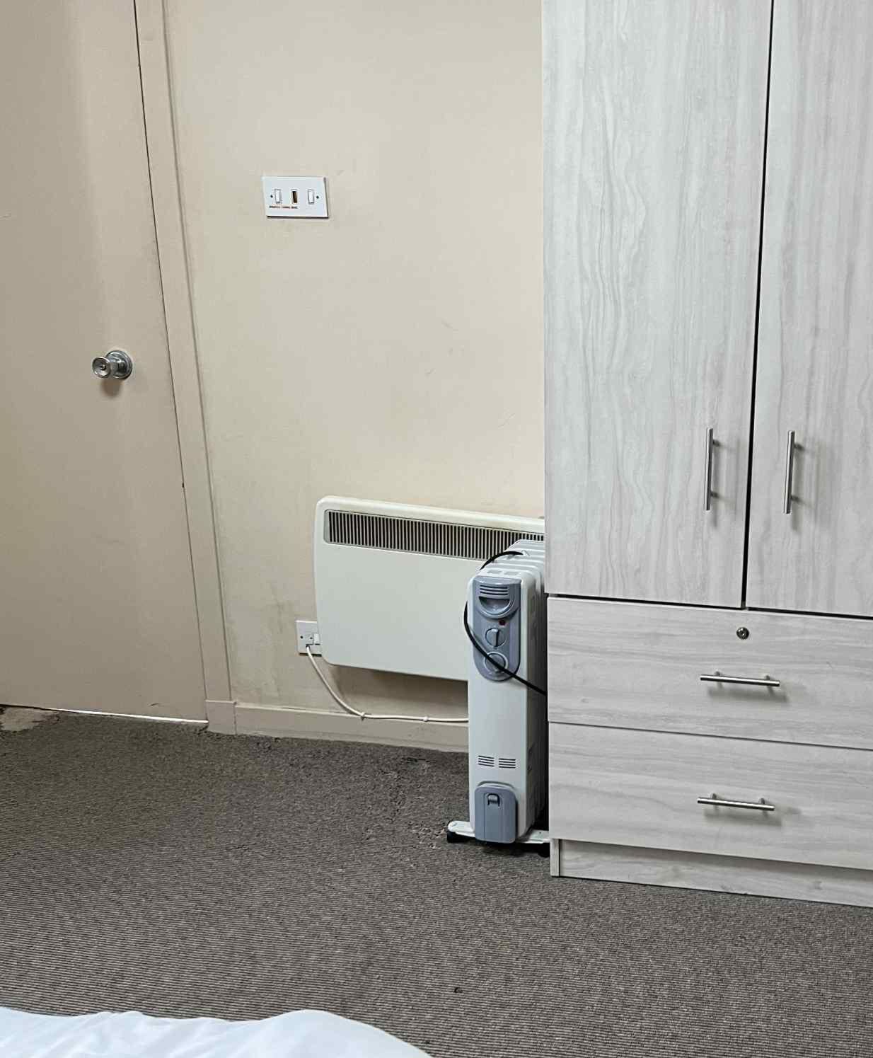 Worn carpet, drawers fell off