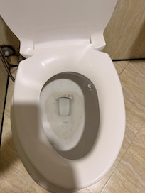 Stained and off the hing seat