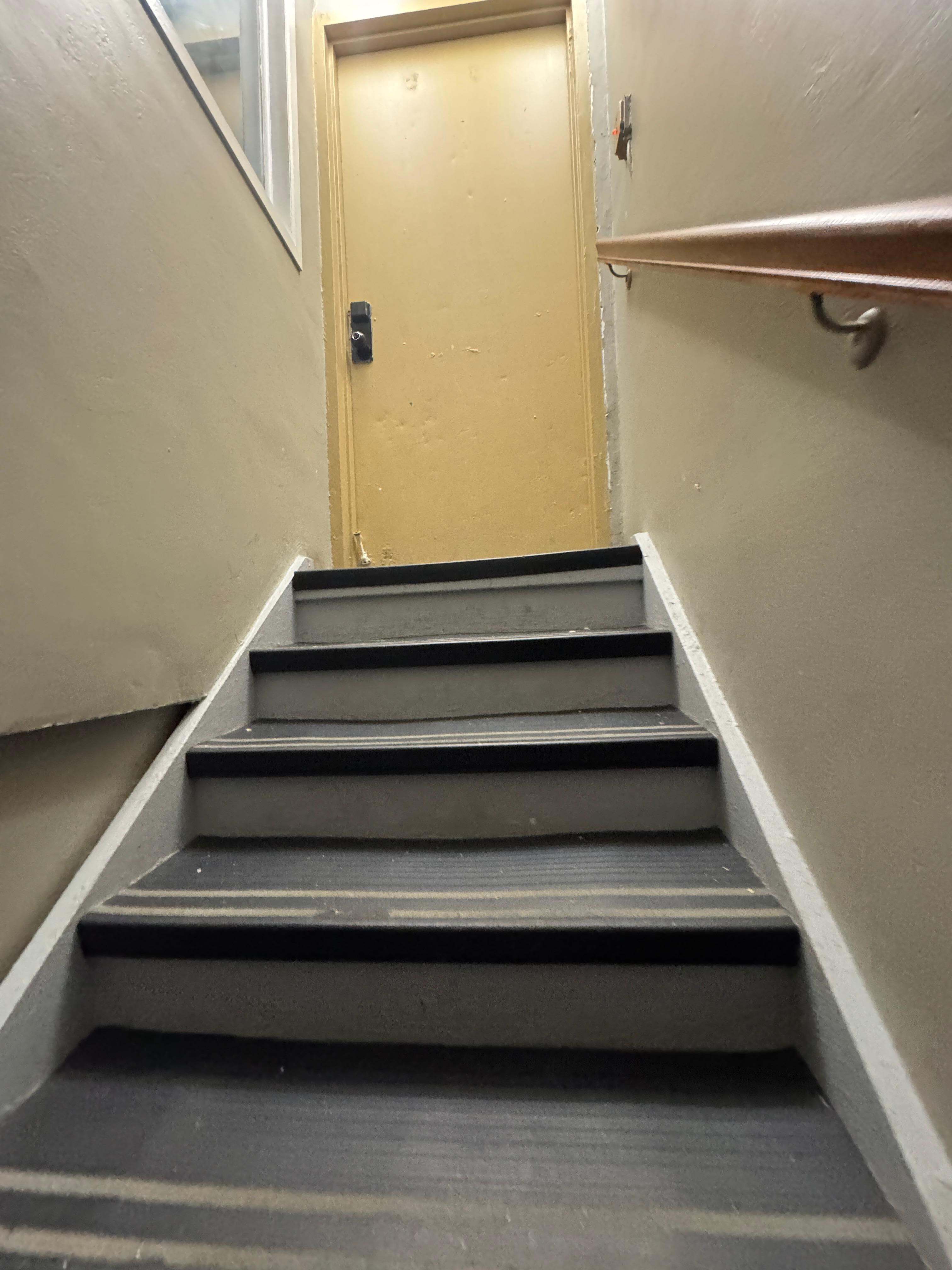 Leaving gym room to go back upstairs to main floor. Stairwell lights up when you enter. It felt a little creepy and unsafe the first time going to the gym room. 