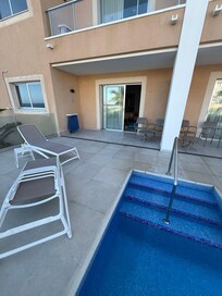 Late afternoon from swim-up pool towards room
