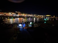 The boats with lanterns on the water