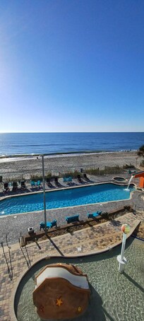 Pool below balcony.