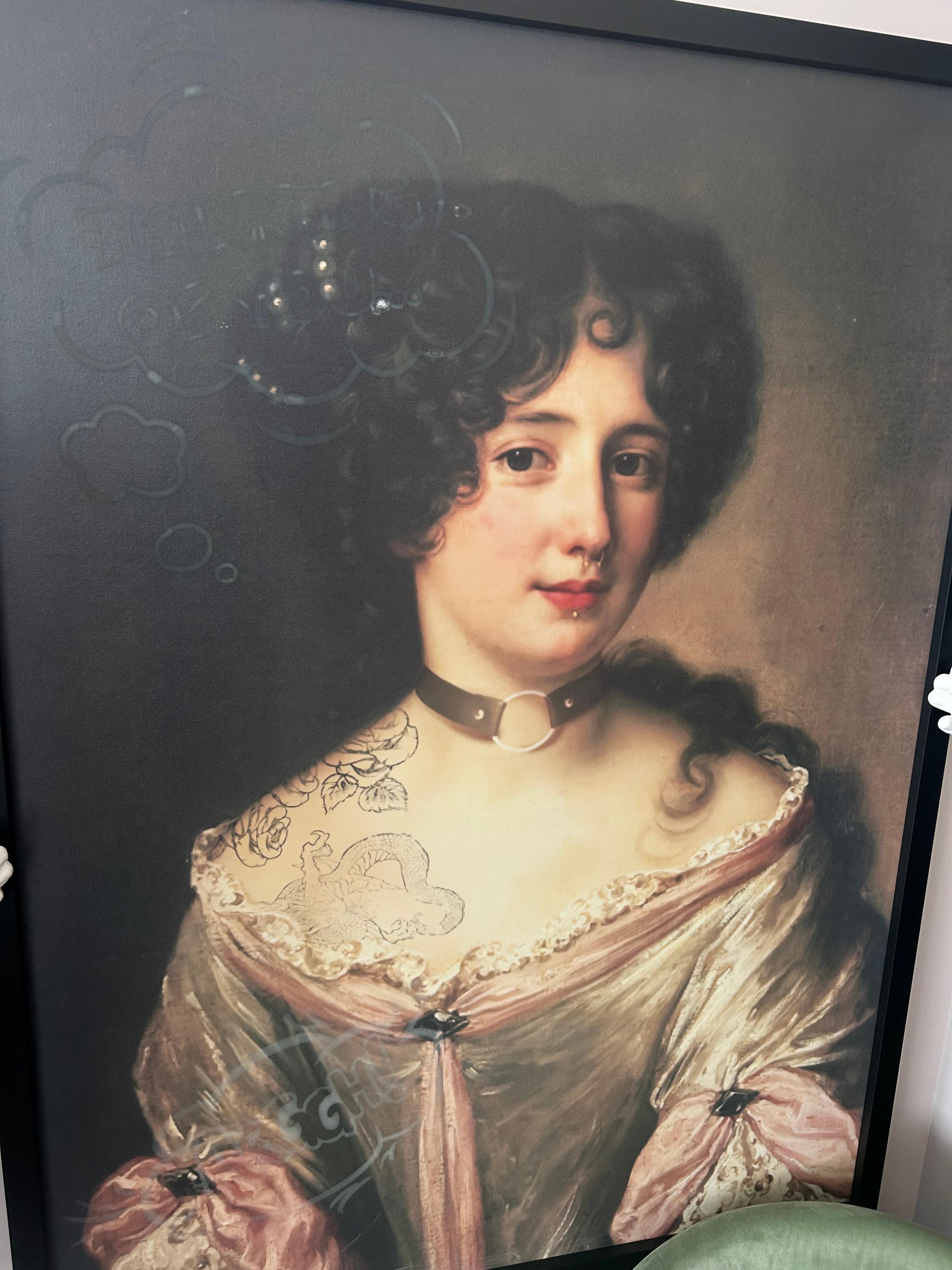 The scary picture staring right at the beds 