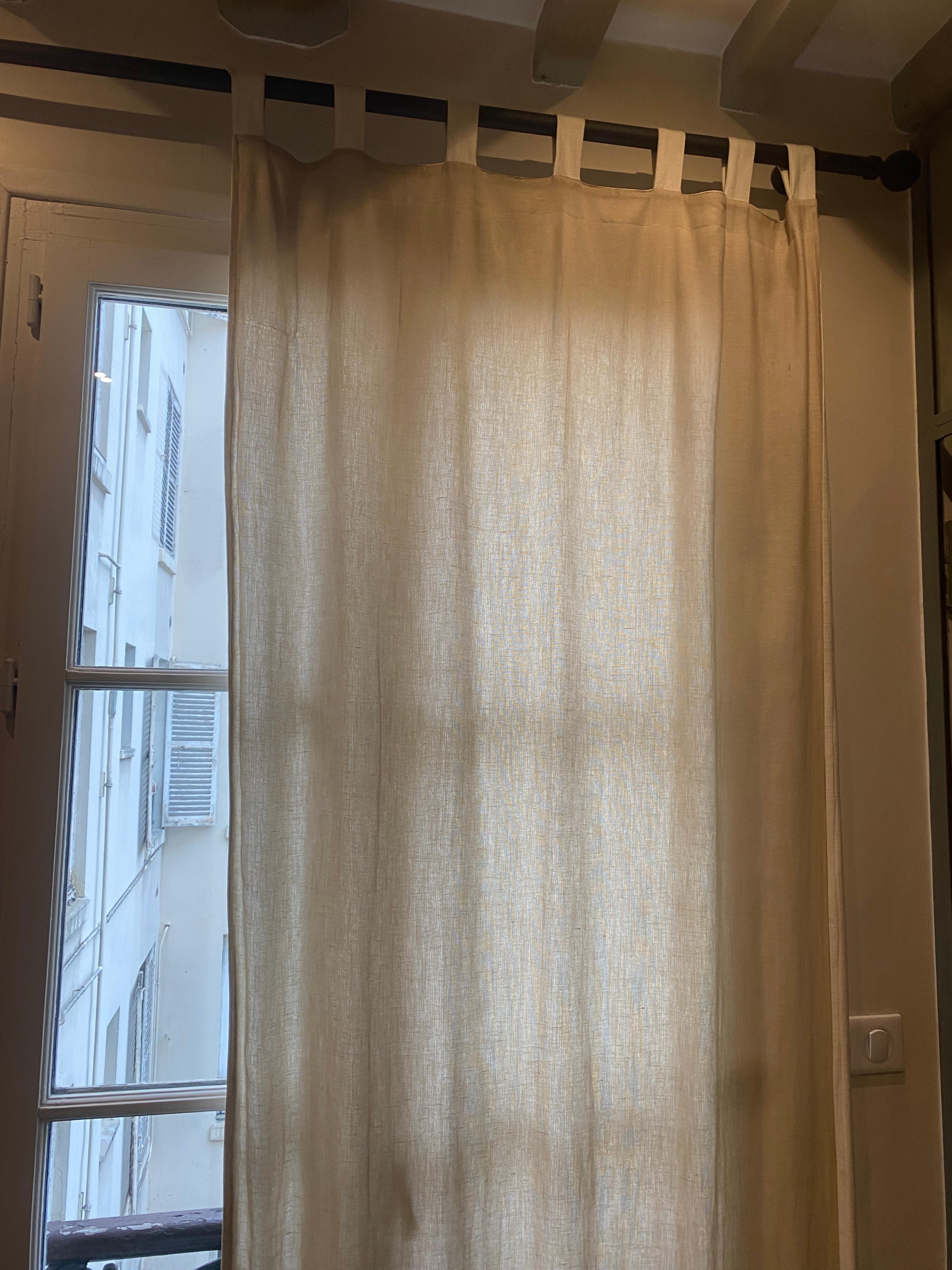 Curtains (drapes) don't cover the windows - privacy and early morning light