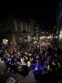 DJ below the balcony during São João