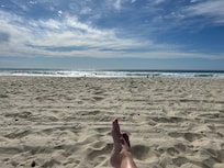 The beach - towels, beach chairs and beach toys provided