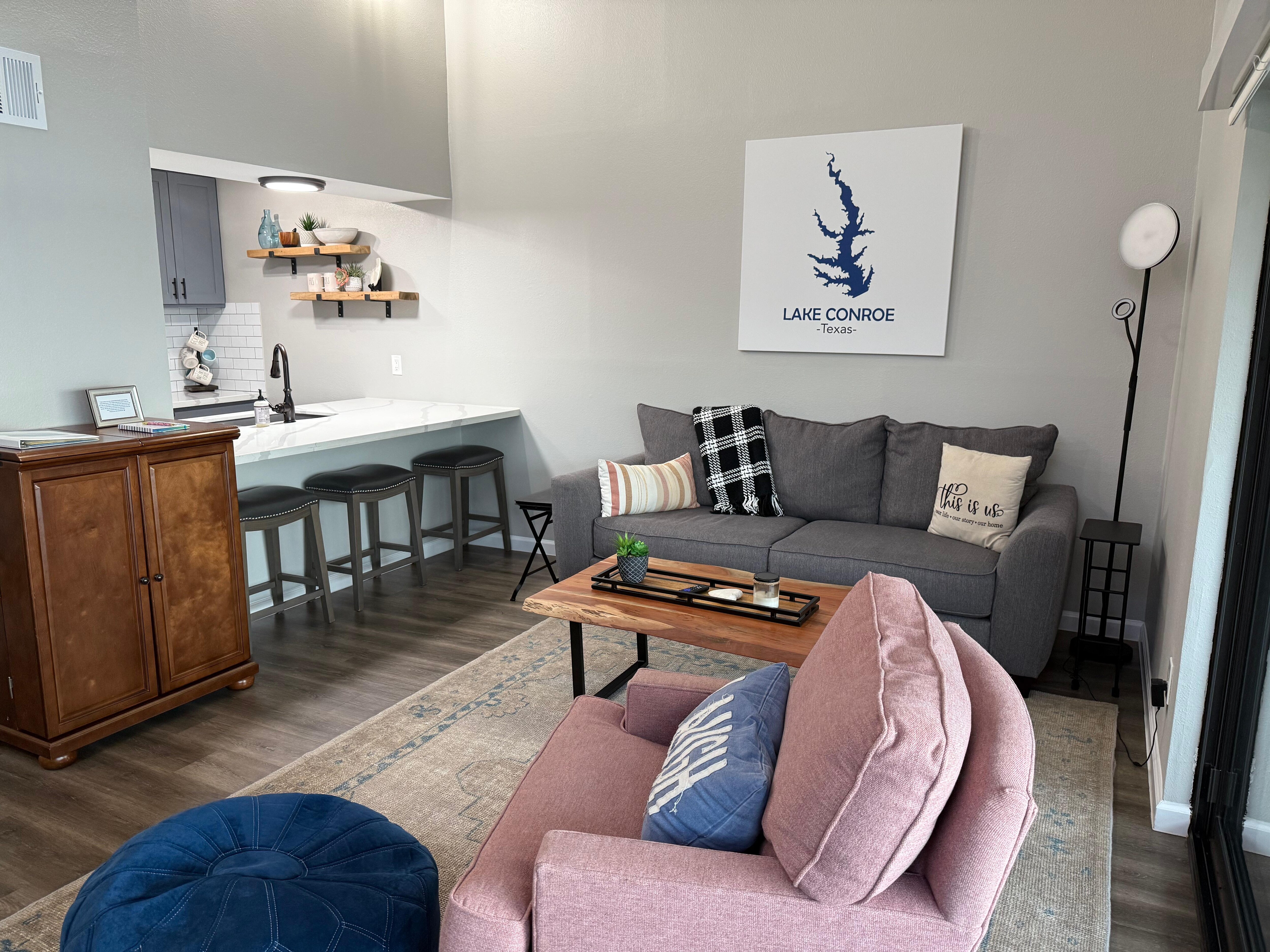 Open living room into the kitchen bar perfect for hanging out and looking at the lake.
