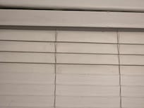 Dusty blinds.
