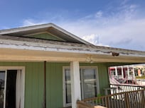Rotten soffits and fascia.