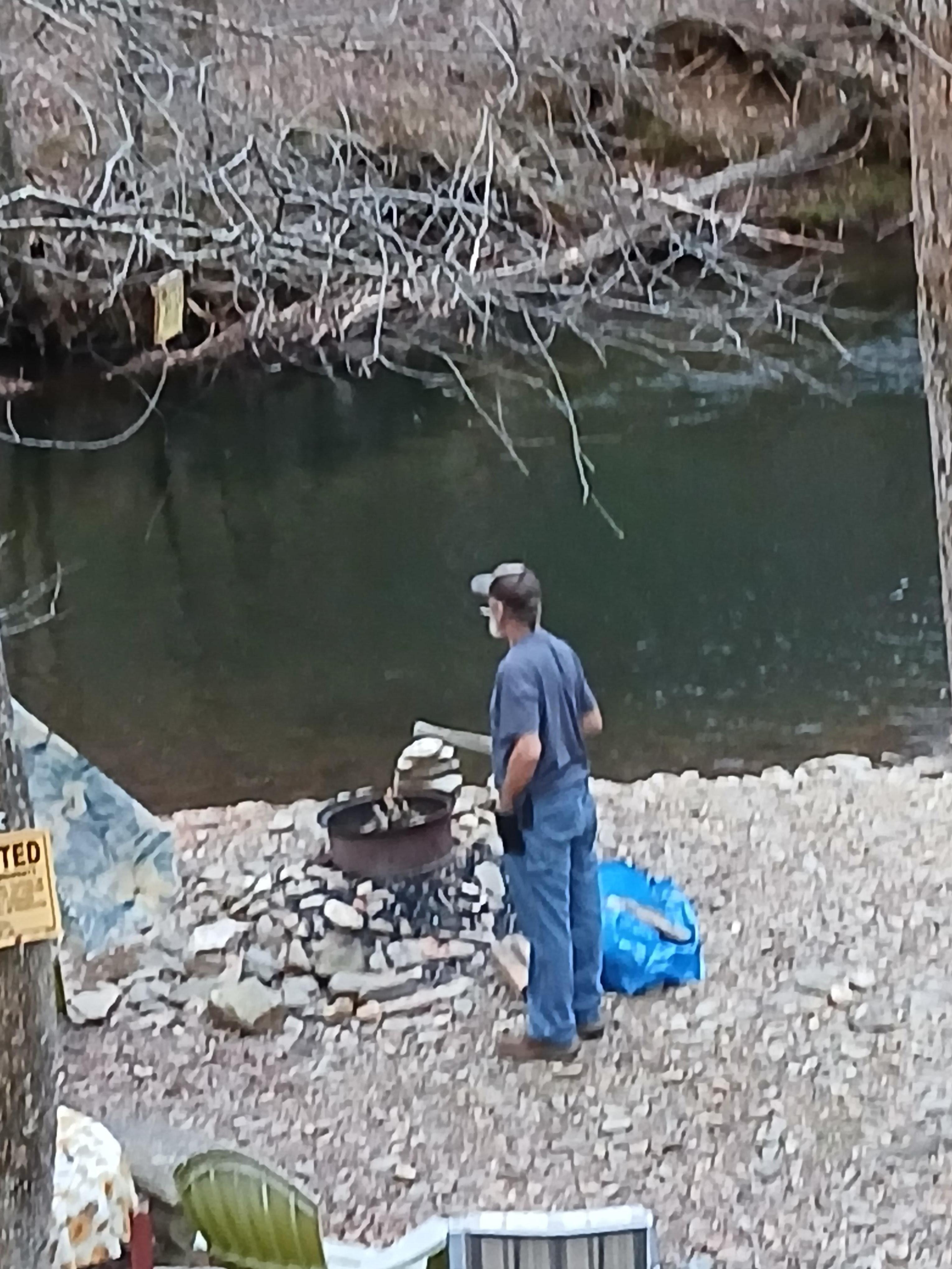 Firepit by Stream behind cabin