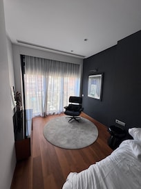 Spacious bedroom with sitting area.