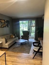 My initial room with no lighting and no socket for a desk lamp.