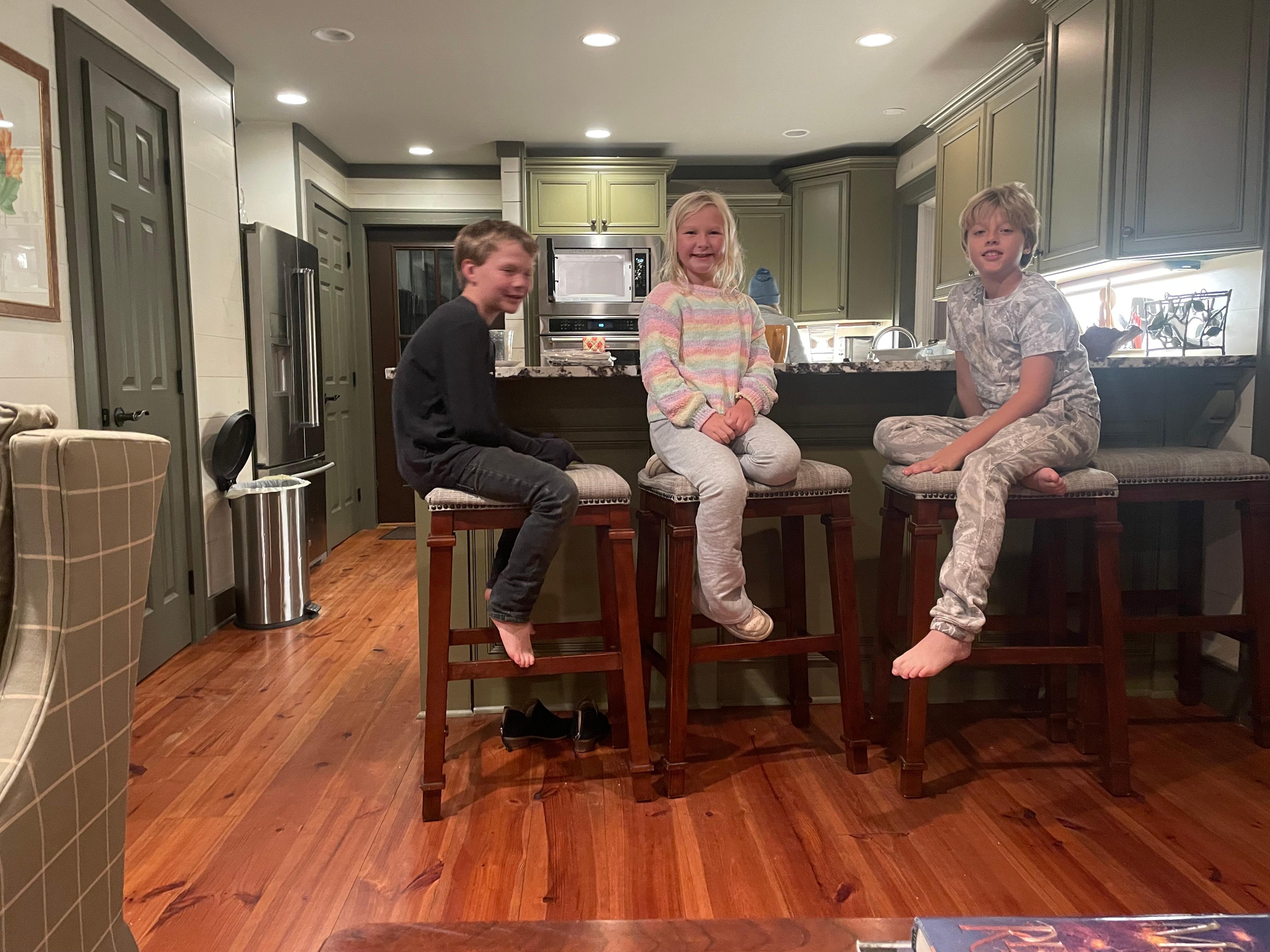 Grandchildren enjoying a treat.