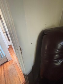 The paint and walls are damaged throughout
the house clearly from hard use.